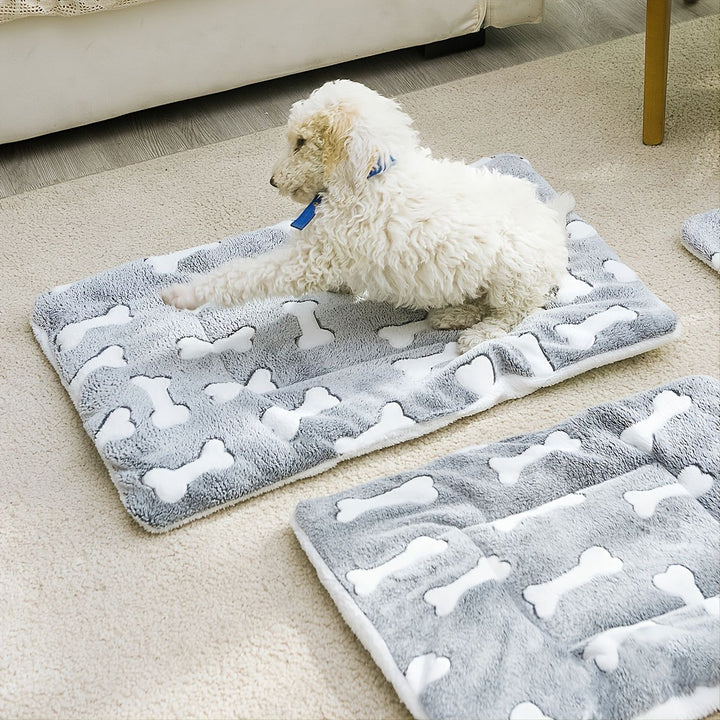 Thickened pet bed mat on the floor