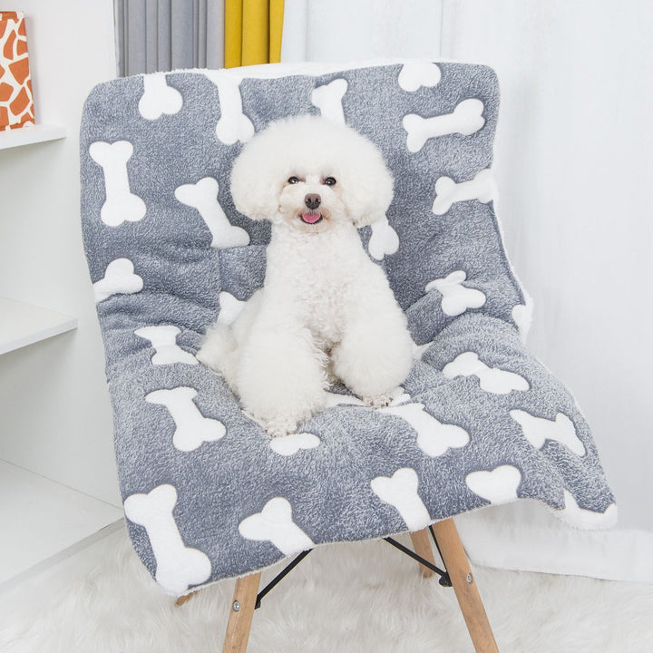 Pet sleeping mat in size comparison view