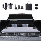 Truck bed air mattress inflated inside a pickup truck bed