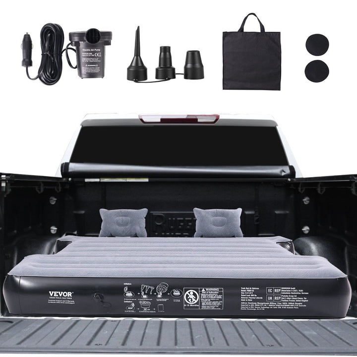Truck bed air mattress inflated inside a pickup truck bed
