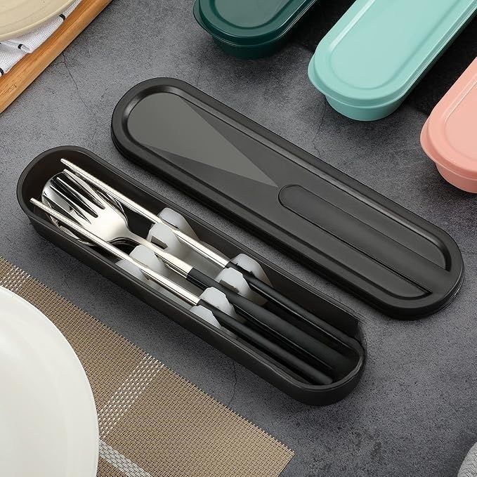 Travel cutlery set with reusable stainless steel fork, knife, and spoon shown fitted into their compact carrying case