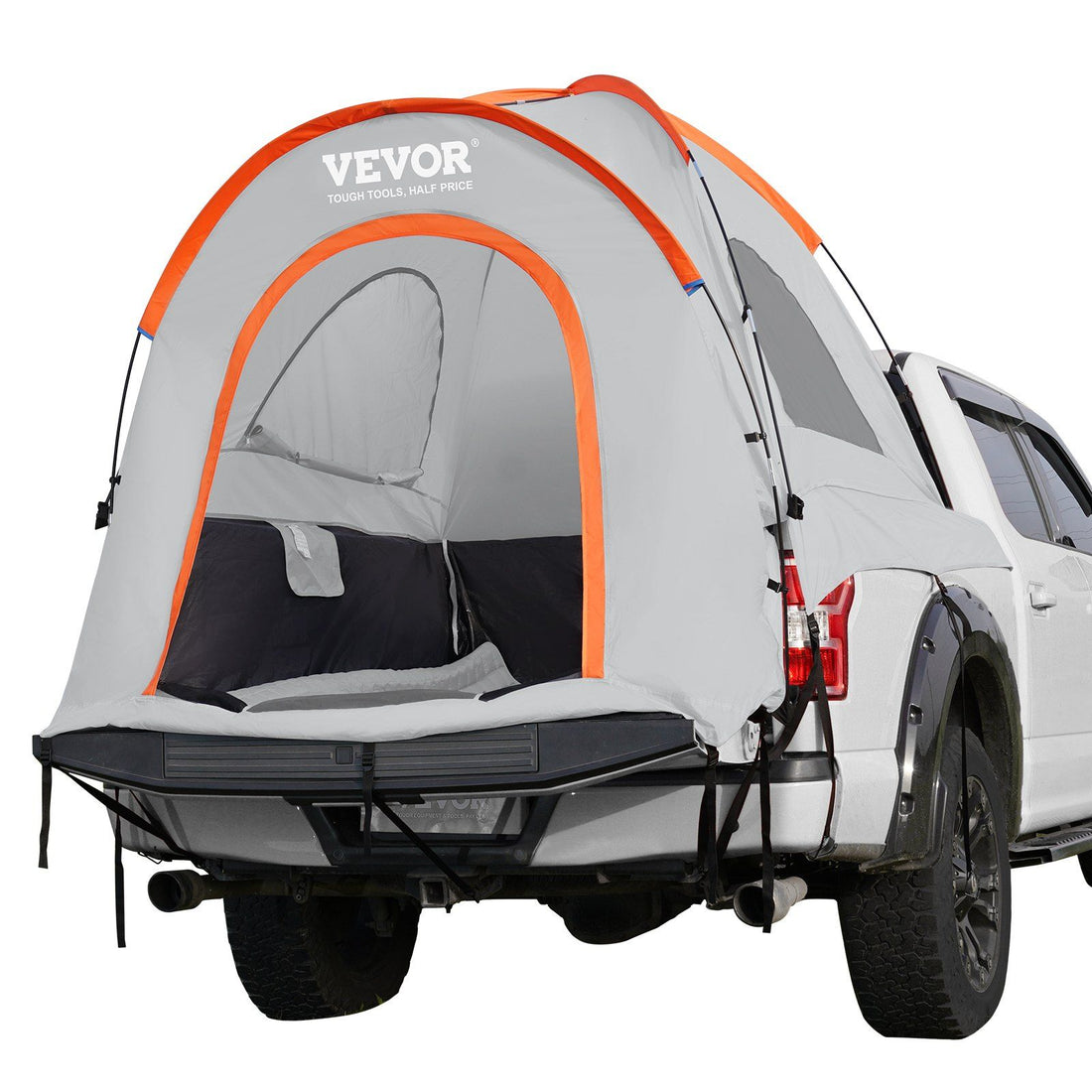 Truck bed tent rain cover detail in outdoor camping setting