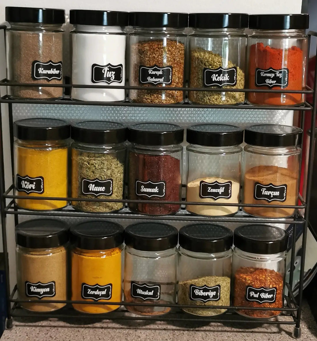 Kitchen storage box filled with pantry snacks and packets