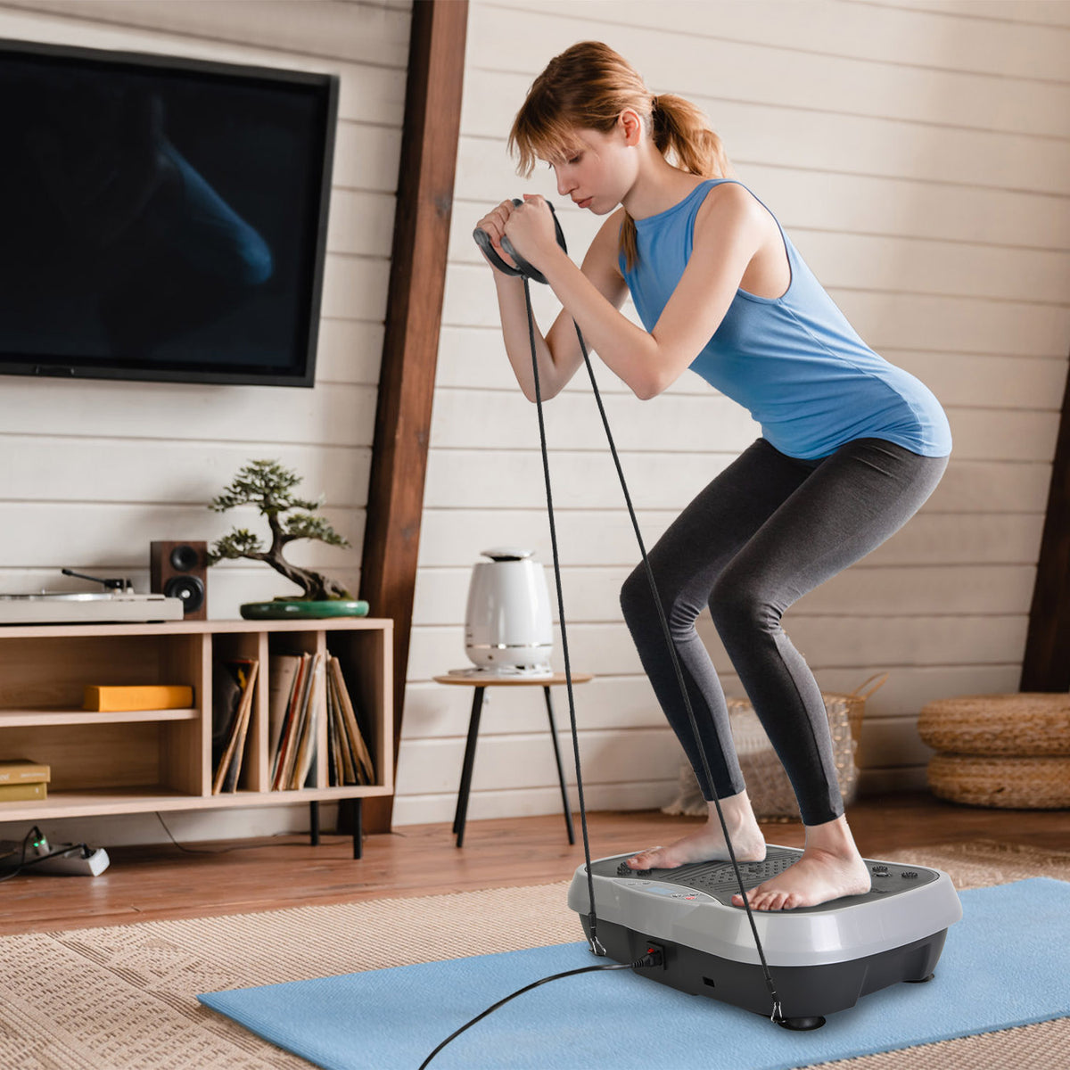 Vibration exercise machine with attached resistance bands and remote control