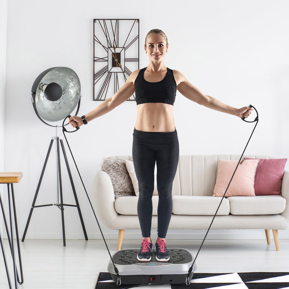 Vibration exercise machine standing on hardwood floor