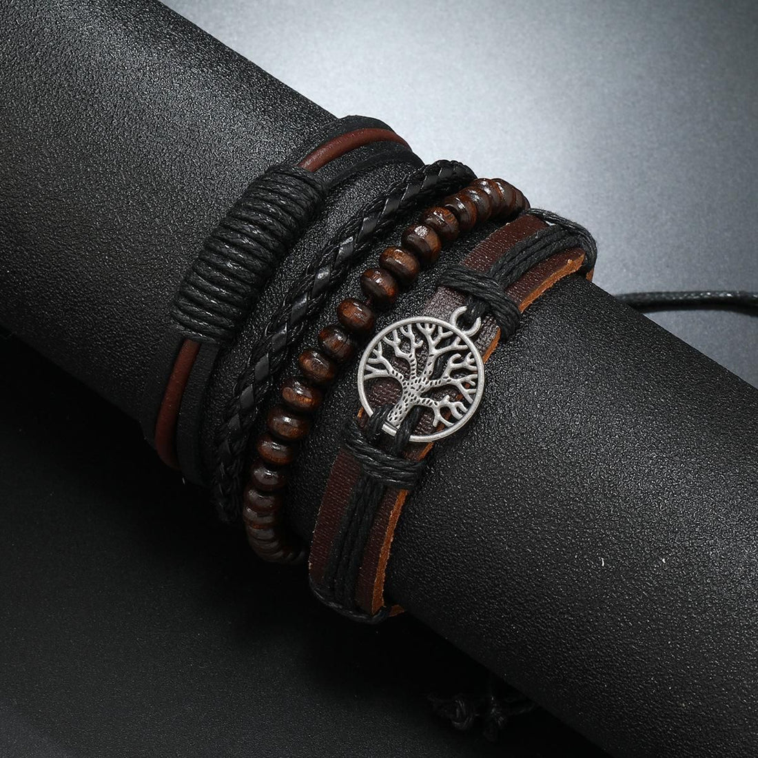 Vintage tree of life leather bracelet set on wrist, four-piece boho stack