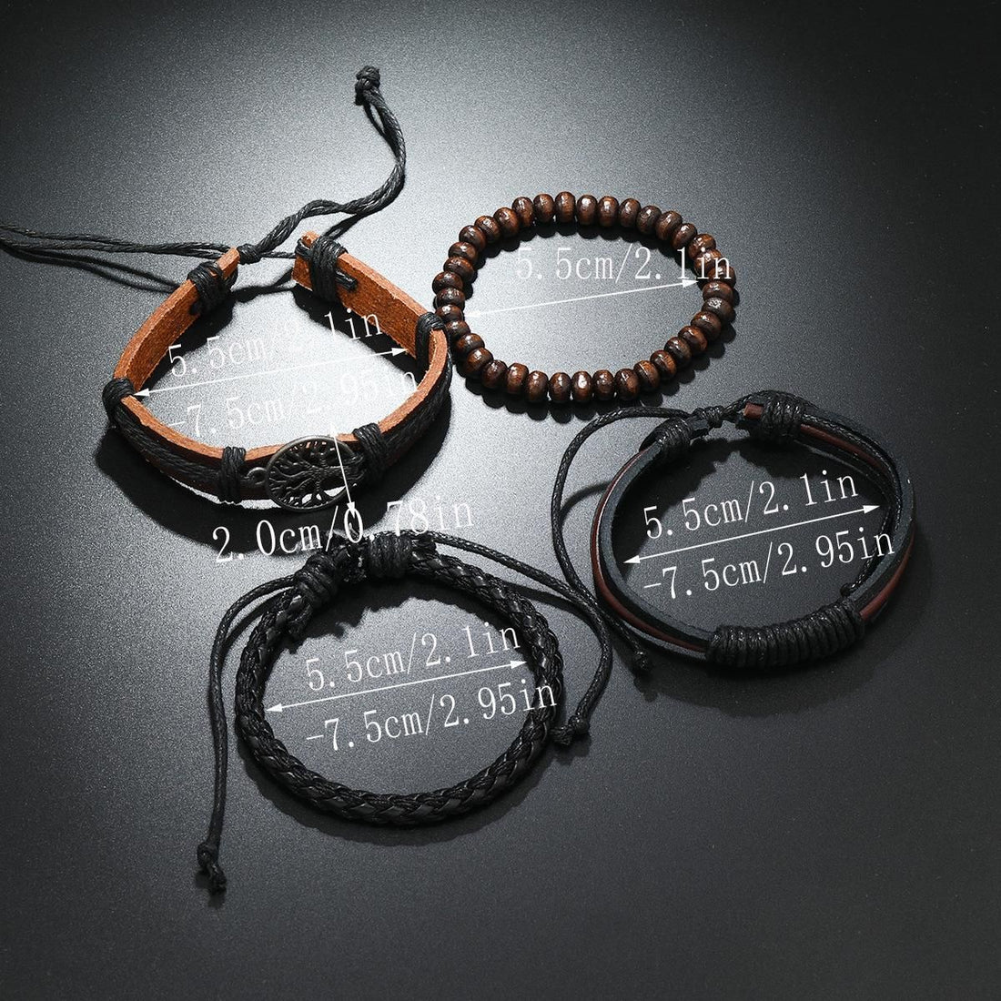 Four-piece vintage tree leather bracelet set flat lay