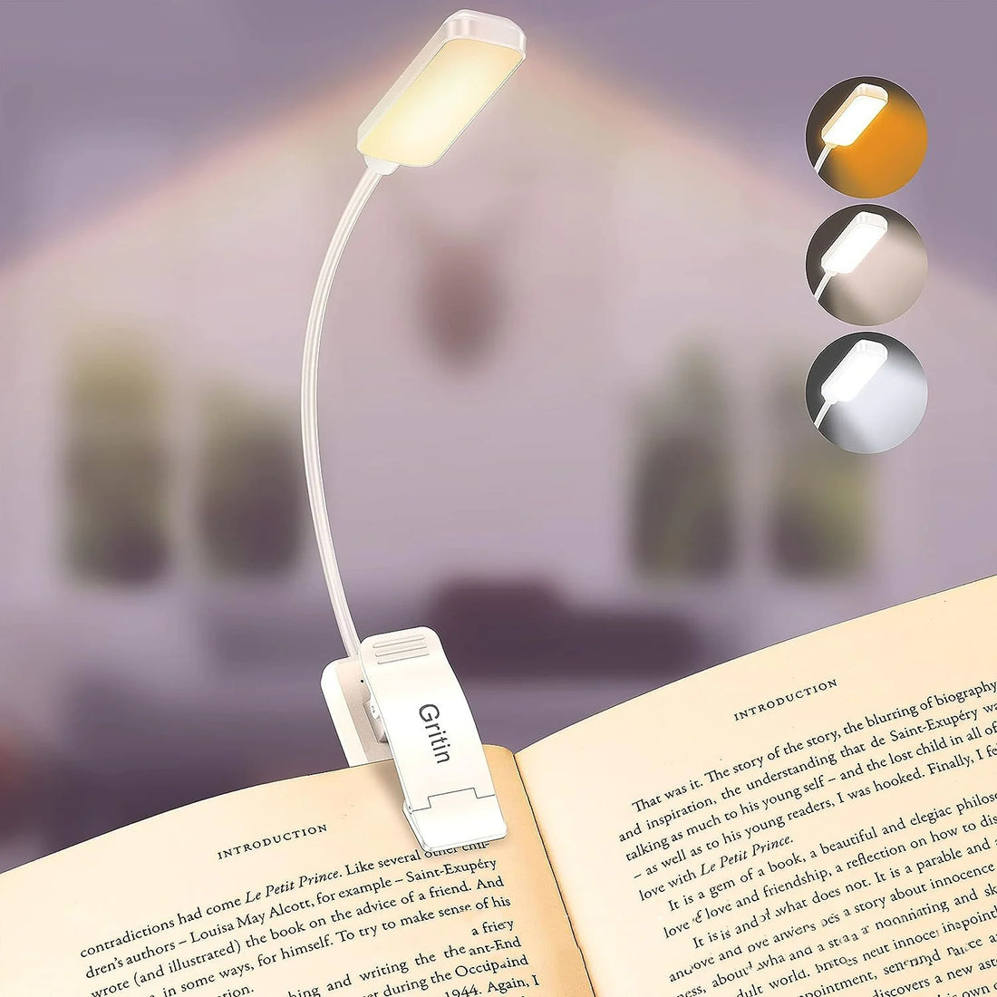 Light's clip mechanism shown open before attaching to a book