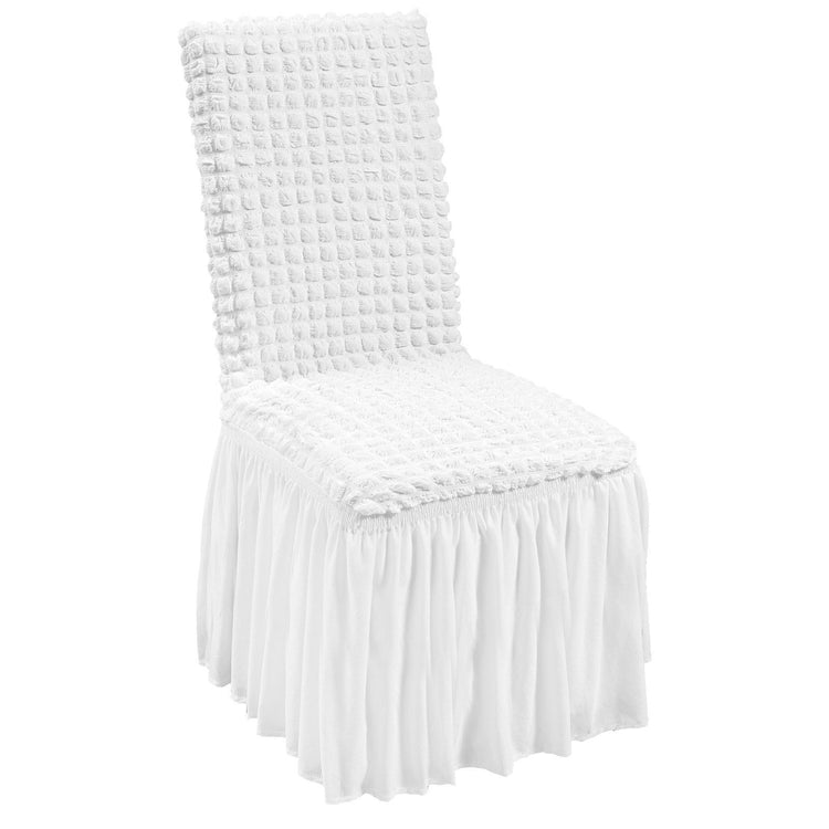 white spandex folding chair covers row at a wedding reception