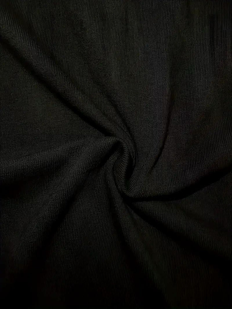 Black faith tee worn with jeans