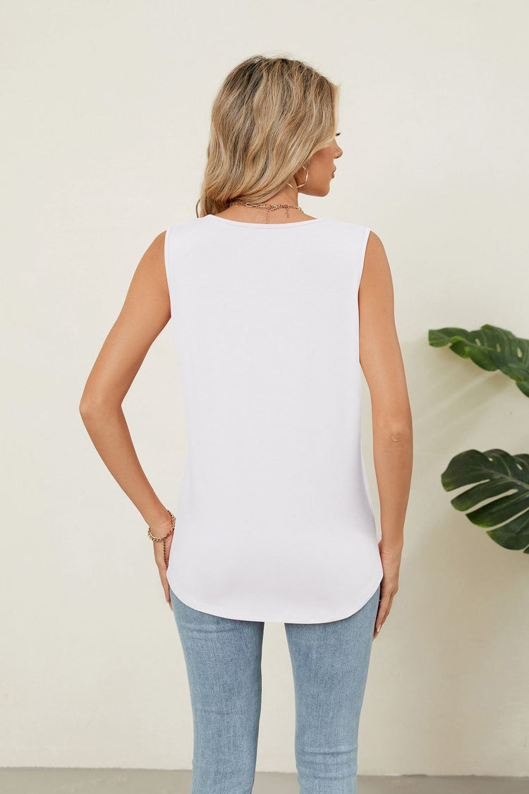 Loose-fit tank top styled with denim
