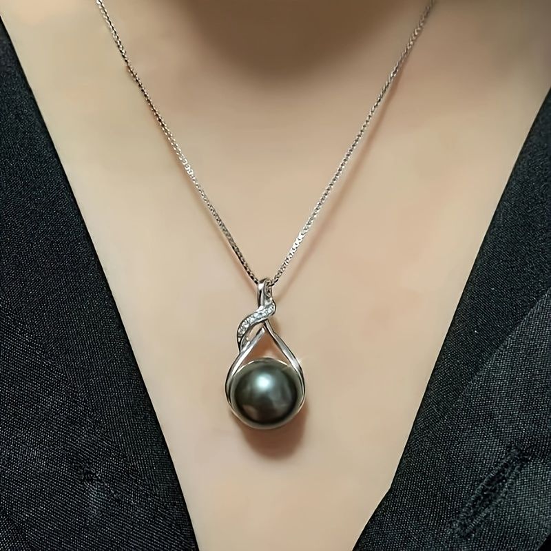 Women's Tahitian-style black pearl necklace with silver-tone chain