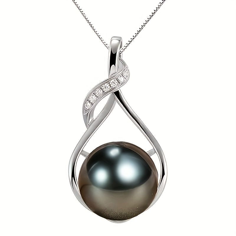 Black pearl pendant close-up on Tahitian-style necklace