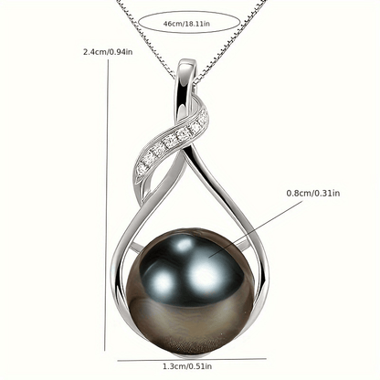Handmade black pearl necklace on display, gift-ready
