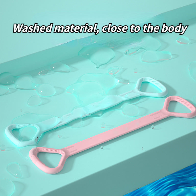 Pink and mint yoga bands laid on a wet surface highlighting the smooth material