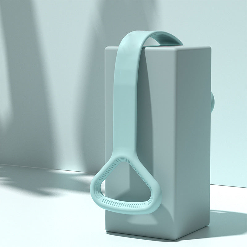 Mint yoga band draped over a display block showing the handle and material