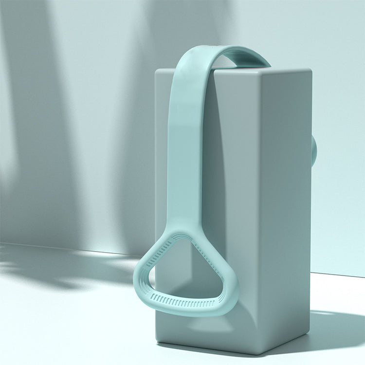 Mint yoga band draped over a display block showing the handle and material