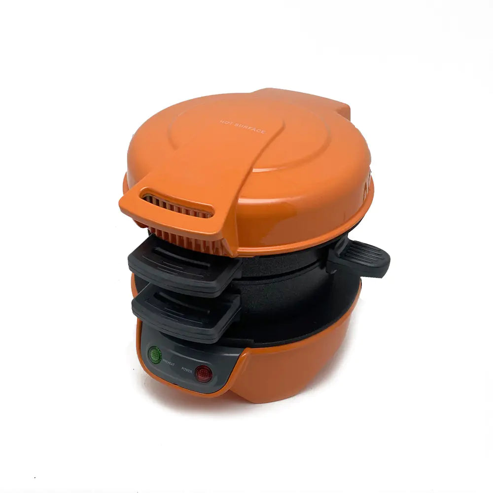 Breakfast sandwich maker cooking plates close-up