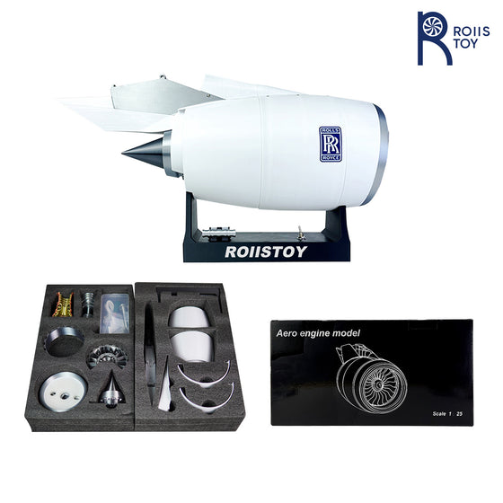 White turbofan jet engine model on a stand with a tray of parts and an instruction card