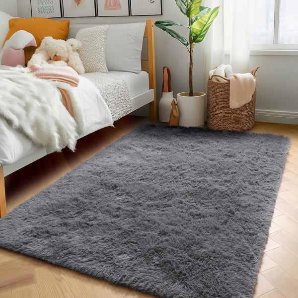 5x8 grey shag area rug in a living room