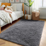 5x8 grey shag area rug in a living room
