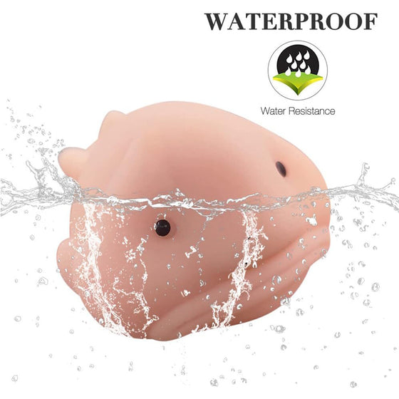 Pink blobfish squishy toy splashing in water, water-resistant TPR