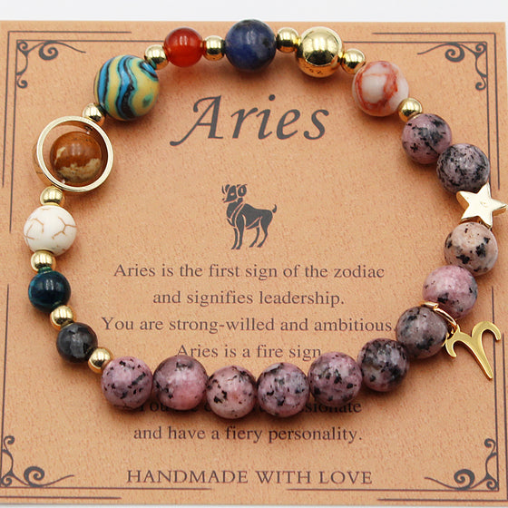 Aries zodiac bead bracelet on its card, sign for reference