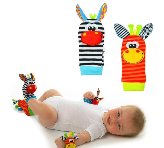 Baby wearing rattle wrist bands