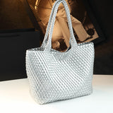 Cowhide tote bag strap and handle close-up