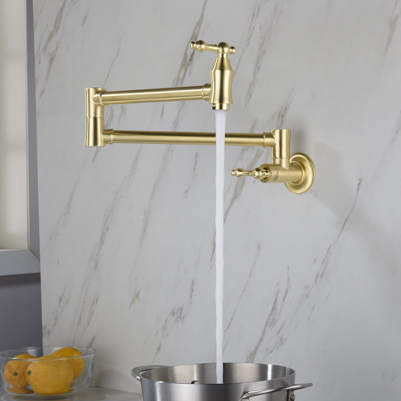 Folding kitchen faucet in gold finish upright position