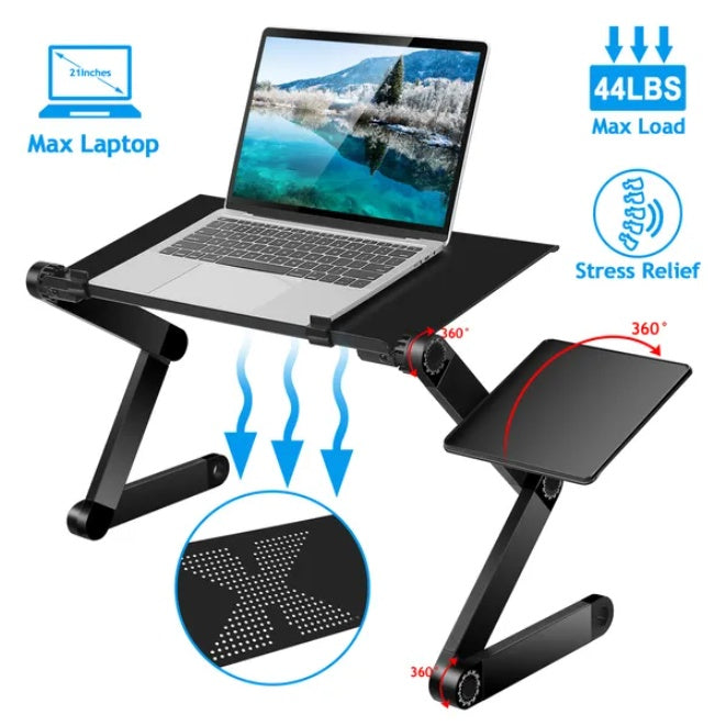 Foldable laptop desk on sofa with laptop and notebook