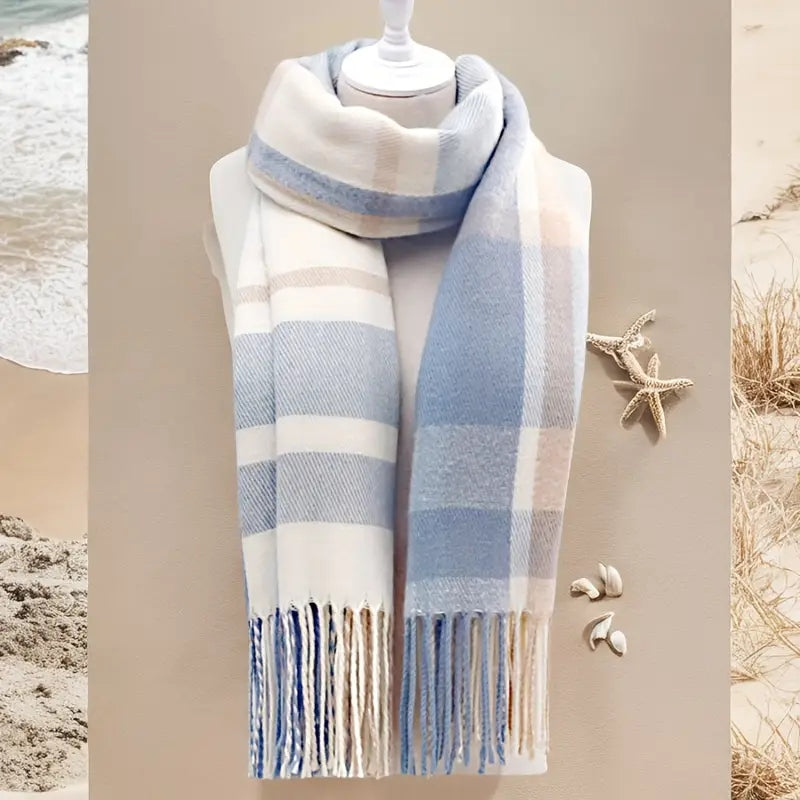 Blue and cream plaid tassel scarf laid out with the fringe showing