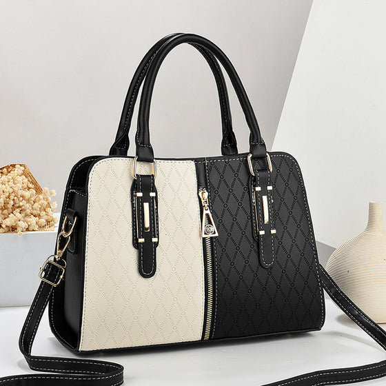 Black and cream quilted handbag with handles