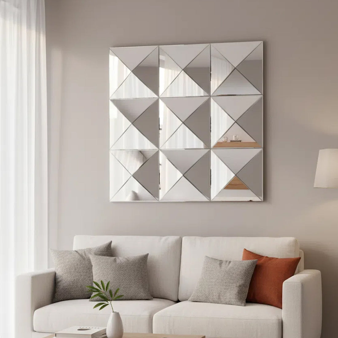 3D beveled wall mirror shown in a living room