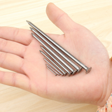Fine iron nails for wood, long and made of solid wood board