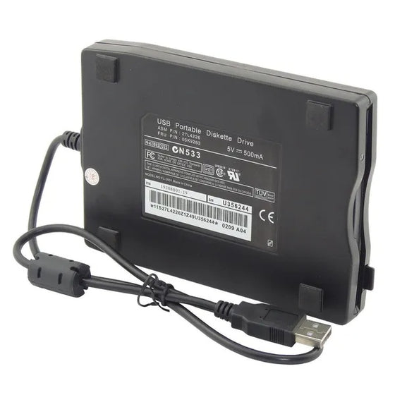 Bottom of the USB floppy drive with label and attached cable