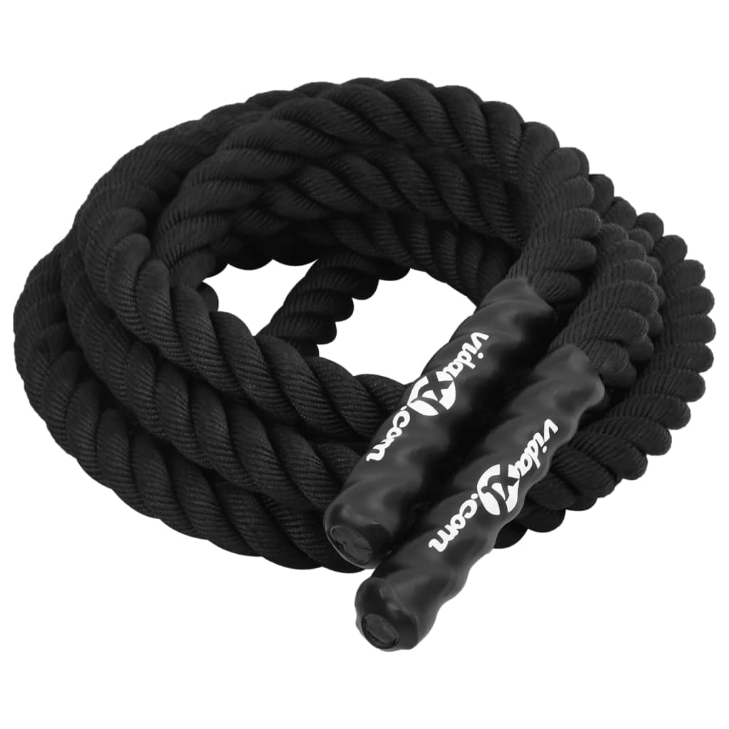 Battle rope slam exercise in a home gym