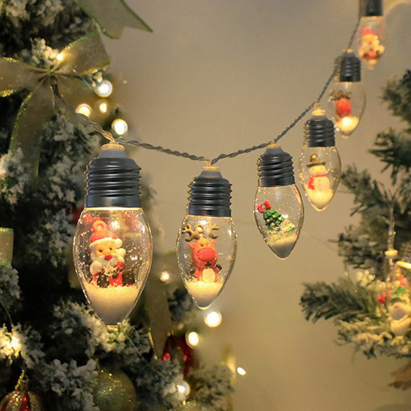 Christmas character string lights with Santa and snowman bulbs on a tree