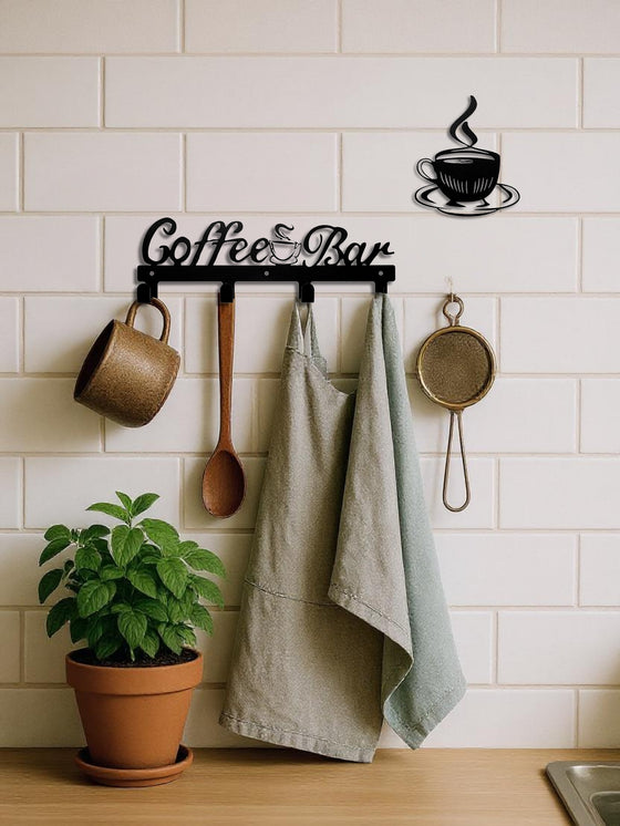 Coffee Bar hook sign holding mugs and towels on a white tile wall