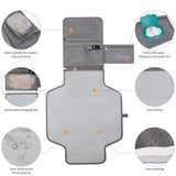 Baby changing pad folded into clutch