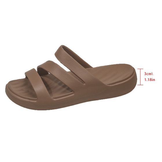 Side view of a brown sandal with a 3 cm sole marked