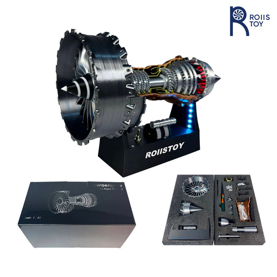 Cutaway turbofan jet engine model on a stand with a box and parts tray