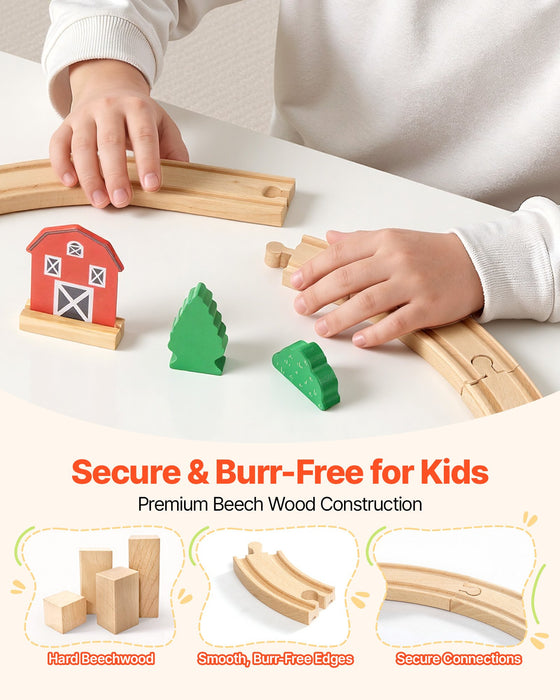 Child connecting beech wood train track with a barn and trees