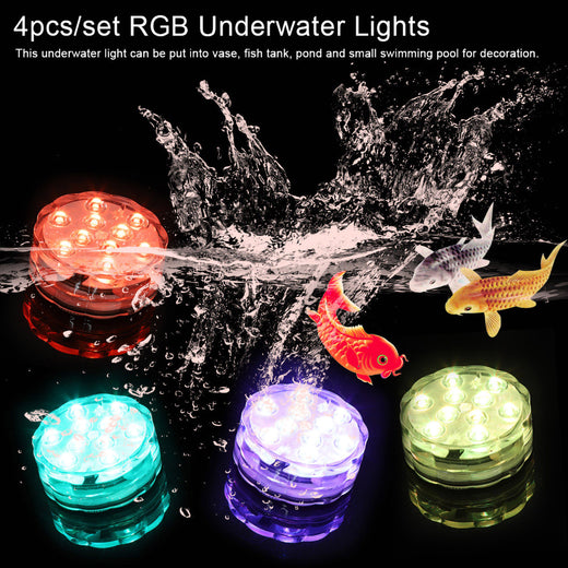 Submersible LED lights glowing in glass vases