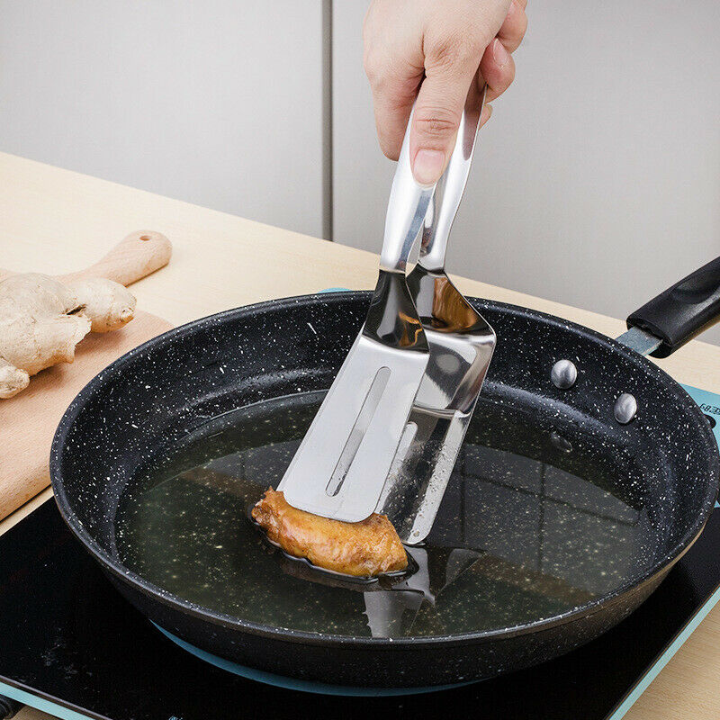 Stainless steel tongs clip mechanism close-up