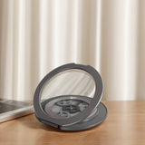 Star wheel phone stand unfolded and holding a smartphone