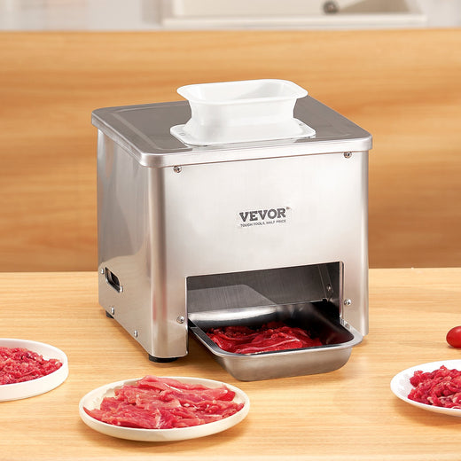 Meat slicer on kitchen counter with sliced meat