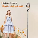 Selfie stick tripod freestanding with phone mounted