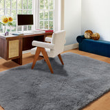 Grey shag rug placed under a bed