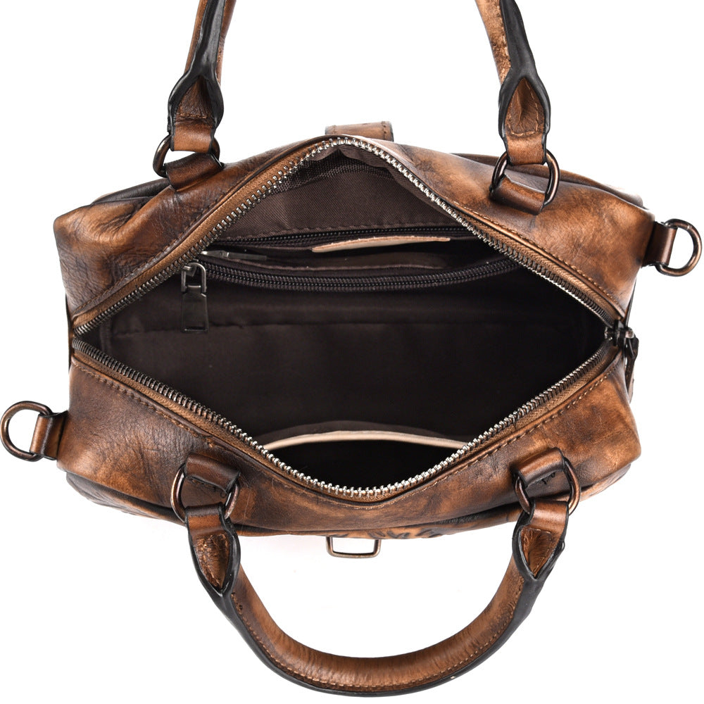 Leather crossbody bag clasp closure close-up